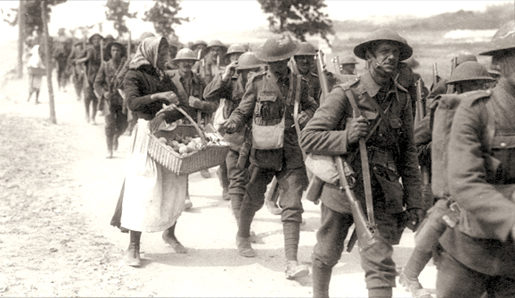A French woman sells fruit to Canadian soldiers in 1918. [PHOTO: ARCHIVES OF ONTARIO—C224-0-0-9-49]